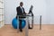 Businessman Working Sitting On Pilates Ball