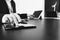 businessman working with smart phone and digital tablet and laptop computer in modern office,balck and white