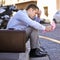 Businessman, worry or job loss in street with letter, stress or thinking of career crisis. Salesman, pink slip or mental