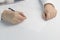 Businessman writes on a sheet of white paper. Dressed in a shirt and tie. Close-up