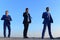 Businessmen with confident faces in formal suits