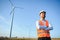 Businessmen engineering standing handsome smile front of turbine looking away