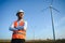 Businessmen engineering standing handsome smile front of turbine looking away