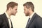 businessmen face to face. disagreed men partners. business competition. arguing businesspeople