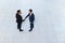 Businessmen Hand Shake Welcome Gesture Top Angle View, Two Business men Make Deal Handshake Sign Up