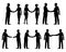 Businessmen handshake silhouettes