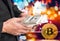 Businessmen hold a large amount of digital currency for bitcoin