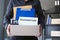 Businessmen are lifting brown paper boxes that collect personal items and resignation letters. The concept of resignation, job