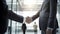 Businessmen making handshake with partner. Generative Ai