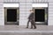 Businessmen near shop window