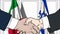 Businessmen or politicians shake hands against flags of Italy and Israel. Official meeting or cooperation related