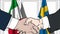 Businessmen or politicians shake hands against flags of Italy and Sweden. Official meeting or cooperation related