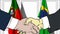 Businessmen or politicians shake hands against flags of Portugal and Brazil. Official meeting or cooperation related