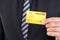 Businessmen presenting credit cards on hand, business concept. Close up
