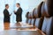 Businessmen Talking In Conference Room