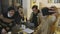 Businessmen talking selfie on smartphone in cafe. Friends using smartphone