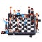Businessmen teams fighting on giant chessboard. Business metaphor of work conflict between colleagues