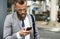 Businessmen Use Mobile Phone Outdoors