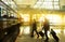 Businessmen walking along a deserted railway station platform