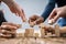 Businesspeople Arranging The Wooden Blocks