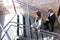 Businesspeople climbing staircase in office