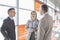 Businesspeople communicating on train platform