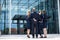 Businesspeople forming a huddle in office premises