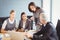 Businesspeople interacting in conference room