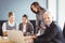 Businesspeople interacting in conference room