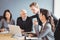 Businesspeople interacting in conference room