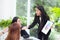 Businesspeople looking at businesswoman opinion different his colleague in meeting.