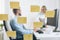 Businesspeople at the office behind a glass wall