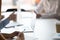 Businesspeople sitting at desk solve issues closeup of people hands