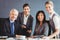 Businesspeople smiling in conference room