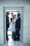 Businesspeople standing in elevator