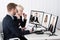 Businesspeople Video Conferencing On Desk