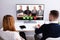 Businesspeople Video Conferencing With Their Partner On Computer