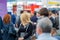 Businesspeople waiting for conference in hall