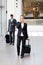 Businesspeople walking in airport