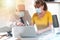 Businesspeople wearing protective medical mask in office during coronavirus outbreak; light effect