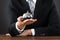 Businessperson Hands Holding Service Bell