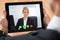 Businessperson Videochatting On Digital Tablet