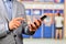 Businesssman using Mobile Banking Application on Smartphone