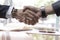 Businessteam with man hand of deal handshake for successful negotiate as celebration partnership