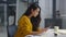 Businesswoman analyzing information on pad. Woman touching green screen on pad