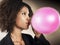 Businesswoman Blowing Up Balloon