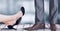 Businesswoman and businessman`s feet and shoes