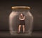 Businesswoman captured in a glass jar concept