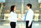 Businesswoman and client handshaking