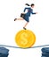 Businesswoman on coin walking on rope